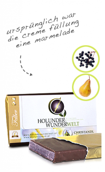 Abbildung Wunderwelt Schokoladentafel Holunder-Birne - dazu Holunderbeeren und eine Birne